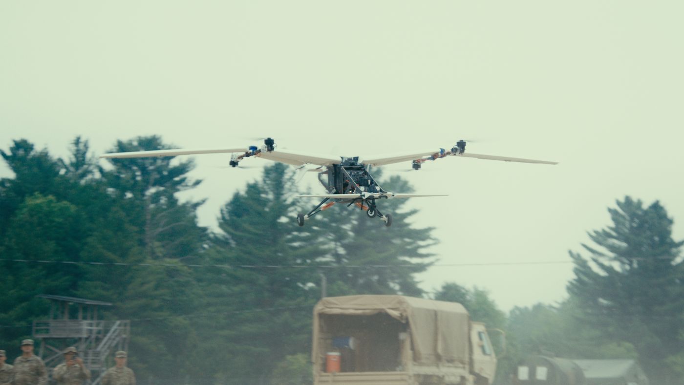 MK2 drone hovering with truck in background