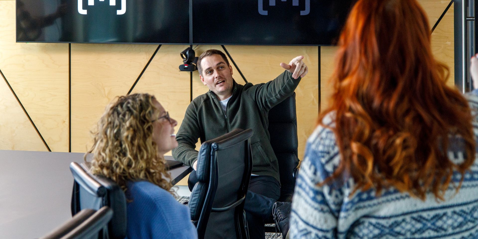 product consultant leads a strategy meeting